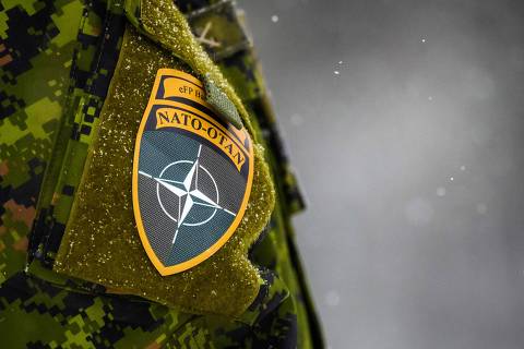 The NATO logo is seen on a uniform during the NATO annual military exercise 
