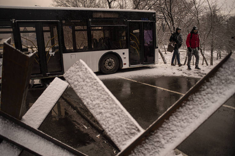 A barricade made of buses and trucks blocking the entrance to Kiev