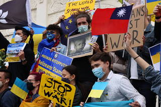 People attend rally against Russia's invasion of Ukraine in Taipei
