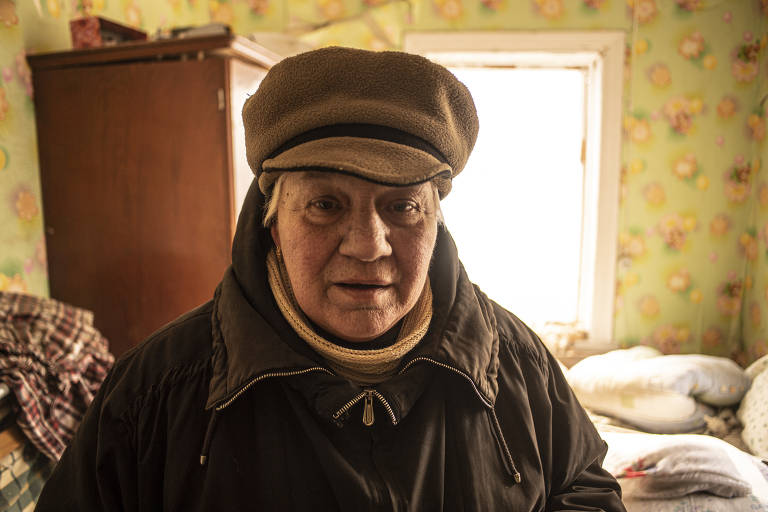 Elena, moradora de Barishivka, cidade atacada pelas tropas de Putin