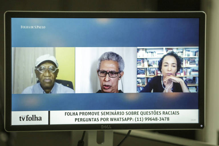 Helio Santos, Wilson Gomes e Flavia Lima durante debate

