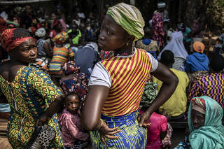 A wedding in the village of Kamakuyor in northern Sierra Leone on Feb. 15, 2022. During the pandemic, the villageÕs district has recorded just 11 COVID-19 cases and no deaths. (Finbarr O'Reilly/The New York Times)