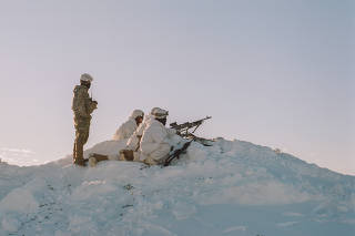 U.S. Army soldiers in a cold-weather military exercise in Alaska, March 14, 2022. (Ash Adams/The New York Times)