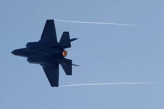 A F-35A fighter aircraft flies during a presentation at the Swiss Air Force base in Emmen