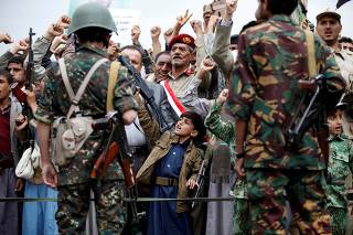 FILE PHOTO: Supporters of the Houthi movement take part in a demonstration, in Sanaa