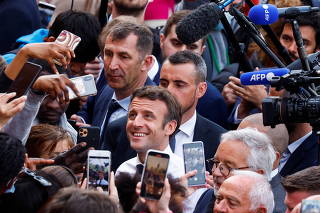 French President Macron campaigns in Dijon