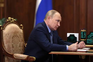 Russian President Vladimir Putin meets with the head of the Republic of Ingushetia Makhmud-Ali Kalimatov in Moscow