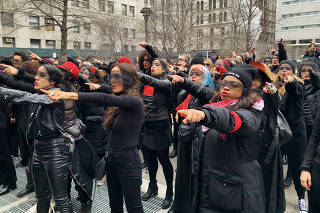 A flash mob protests Harvey Weinstein outside court in New York on Jan. 10, 2020. (Jodi Kantor/The New York Times)