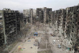 A view shows damaged residential buildings in Mariupol
