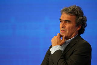Colombian presidential candidate Sergio Fajardo reacts during a presidential debate on national television in Bogota