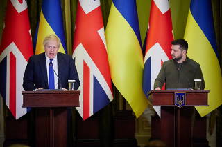 Ukraine's President Zelenskiy and British PM Johnson attend a news briefing in Kyiv