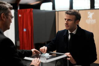 French President Emmanuel Macron votes in Le Touquet