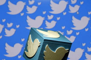 FILE PHOTO: A 3D-printed logo for Twitter is seen in this picture illustration