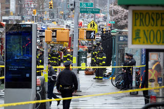 Police and other first responders on the scene after a shooting in a New York subway station on Tuesday morning, April 12, 2022. (Dakota Santiago/The New York Times)