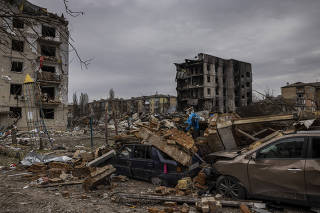 Destroyed buildings and vehicles in Borodyanka, Ukraine, on Tuesday, April, 5, 2022. (Ivor Prickett/The New York Times)