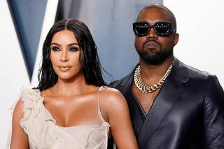 FILE PHOTO: Kim Kardashian and Kanye West attend the Vanity Fair Oscar party in Beverly Hills during the 92nd Academy Awards, in Los Angeles, California, U.S.