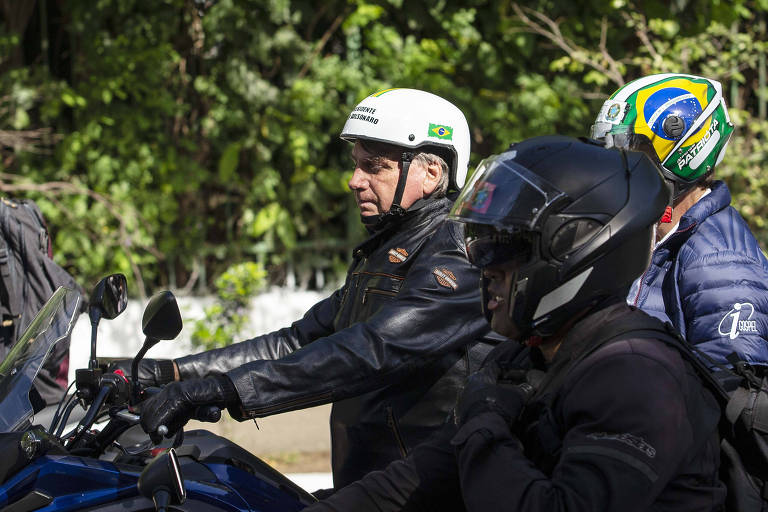 O presidente Bolsonaro em motociata em São Paulo
