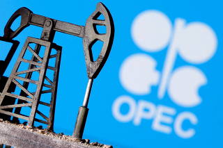 FILE PHOTO: FILE PHOTO: A 3D-printed oil pump jack in front of the OPEC logo in this illustration picture