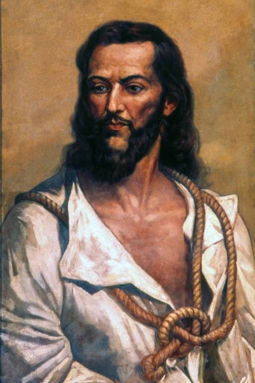 Retrato de Tiradentes. Na imagem, um homem branco de barba e cabelos longos, pretos, olha fixamente para o lado. Há uma corda em volta de seu pescoço.