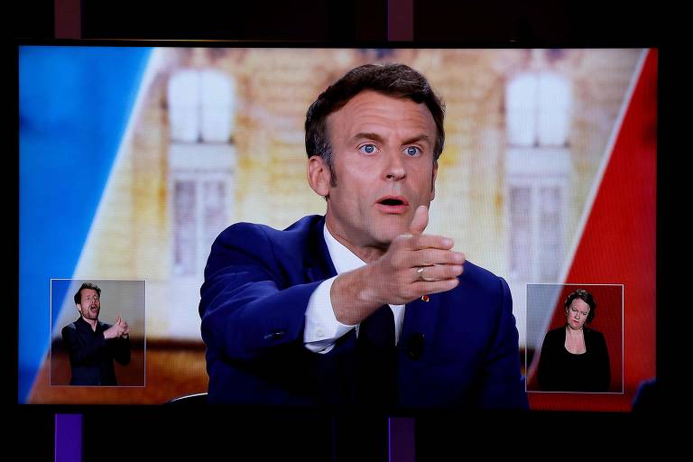 O atual presidente e candidato a reeleição, Emmanuel Macron, à frente nas pesquisas de opinião, em debate com a adversária, Marine Le Pen