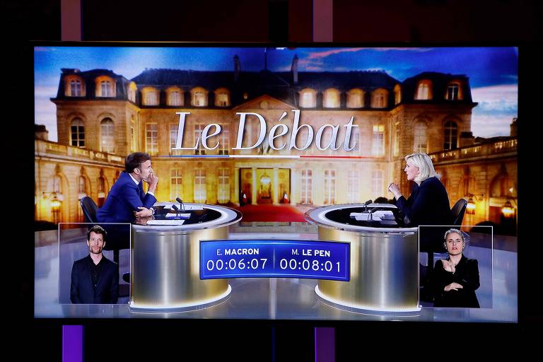 Emmanuel Macron e Marine Le Pen debatem a dias da eleição presidencial