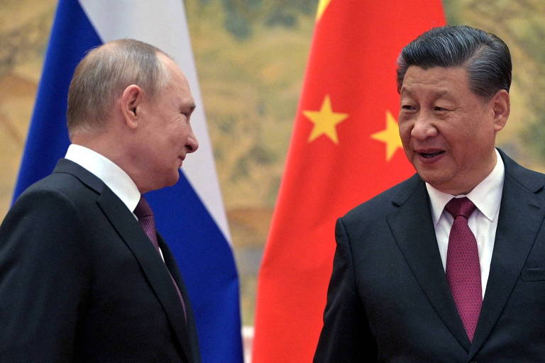 Putin e Xi durante o encontro no qual selaram um pacto, antes do início da guerra