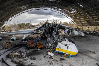The wreckage of Mriya, the world's largest cargo aircraft, at the Antonov airfield in Hostomel, near Kyiv, Ukraine, on Sunday, April 17, 2022. (Daniel Berehulak/The New York Times)