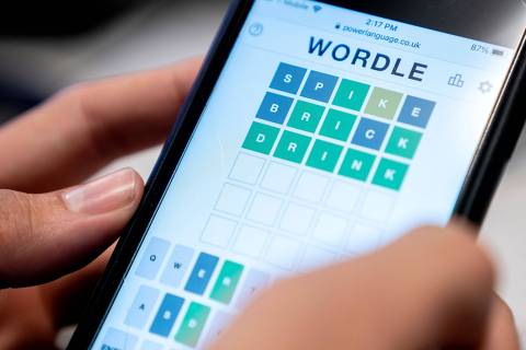 (FILES) In this file photo taken on January 11, 2022 an illustration photo shows a person playing online word game 