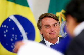 Brazil's President Jair Bolsonaro attends a ceremony at the Planalto Palace, in Brasilia