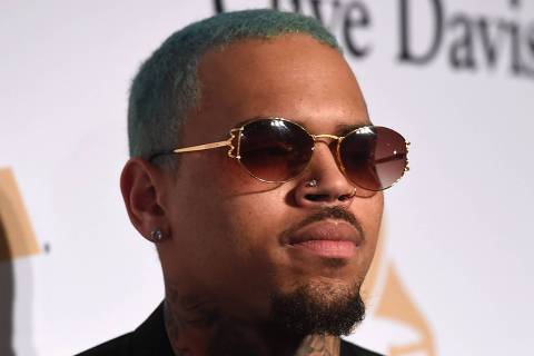 (FILES) In this file photo taken on February 7, 2015 US rapper Chris Brown attends the Pre-GRAMMY Gala at The Beverly Hilton Hotel in Beverly Hills, California. - US rapper Chris Brown is detained in Paris after a rape claim, security sources told on January 22, 2019. (Photo by Jason Merritt / GETTY IMAGES NORTH AMERICA / AFP)