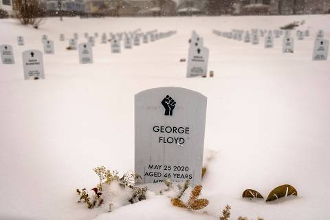 TOPSHOT - A headstone shows George Floyd's name in the Say Their Names Cemetery at George Floyd Square in Minneapolis, Minnesota, on February 22, 2022. (Photo by Kerem Yucel / AFP)