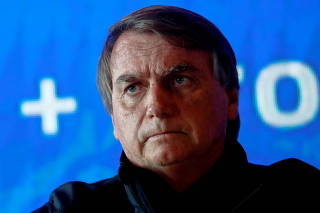 FILE PHOTO: Brazil's President Bolsonaro attends news conference about Amazon rainforest after meeting with Elon Musk in Porto Feliz