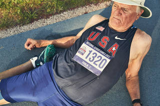 A participant warms up before a National Senior Games track-and-field event in Fort Lauderdale, Fla., May 14, 2022. (Alexander Aguiar/The New York Times)