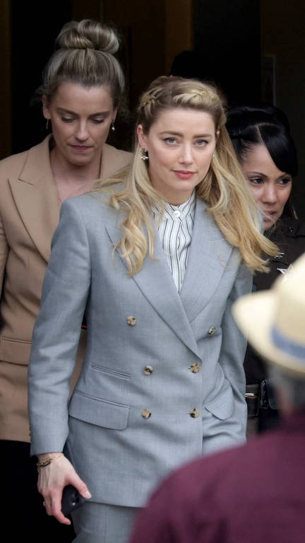 Amber Heard, conhecida principalmente como ex-mulher de Johnny Depp, f