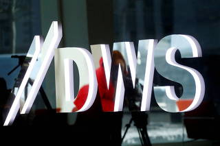 FILE PHOTO: The new logo of Deutsche Bank's DWS asset management business is pictured at its headquarters in Frankfurt