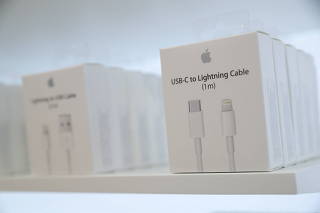 FILE PHOTO: USB-C to Lightning Cable adapters are seen at a new Apple store in Chicago