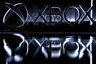 FILE PHOTO: The Xbox logo is seen while gamers wait for the Microsoft Xbox E3 2017 media briefing in Los Angeles, California