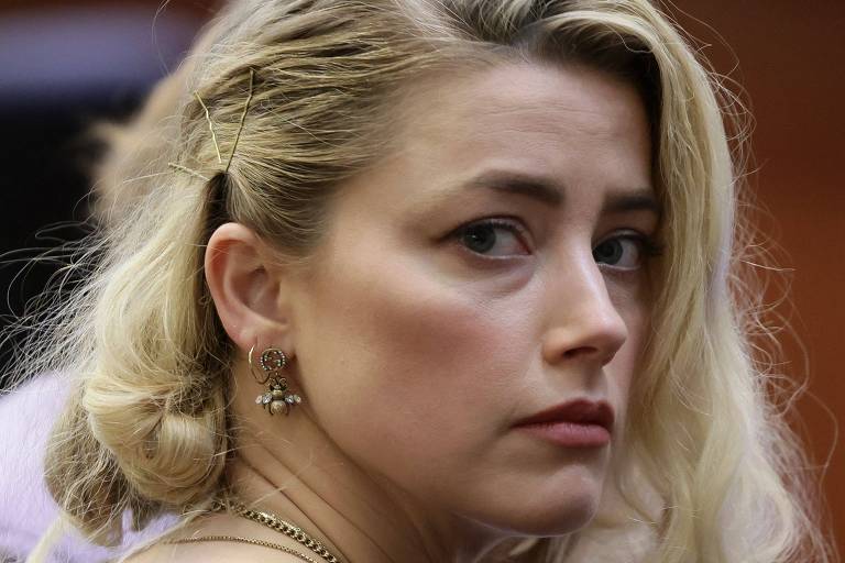 Amber Heard diz que ainda ama Johnny Depp mas teme novos processos