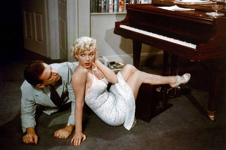Cena do filme "O Pecado Mora ao Lado" com participação de Marilyn Monroe