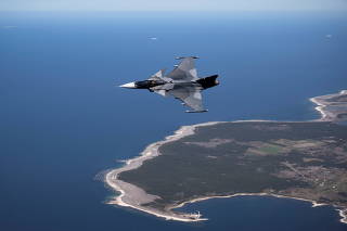 Sweden's jet fighter JAS 39 Gripen E flies over the Gotland island in the Baltic Sea