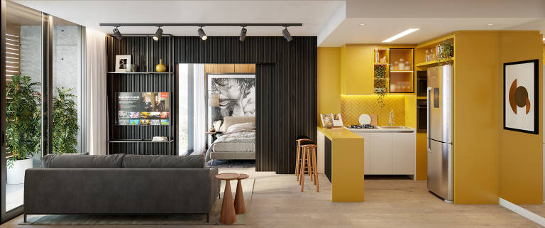 Studio decorado com cozinha amarela