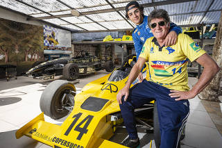 Retrato do piloto de kart e Formula V4 Joao Terssi ,20 ao lado do avo Josi Tesser, 61, com a  replica do carro de corrida Copersucar. Josi eh colecionador de carros e aposta na carreira do neto