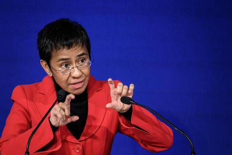 Nobel Peace Prize laureate Maria Ressa delivers a speech during the Cartooning Award Ceremony at the World Press Freedom Day in Geneva on May 3, 2022. (Photo by Fabrice COFFRINI / AFP)