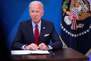 President Biden hosts a virtual meeting with governors inside the White House