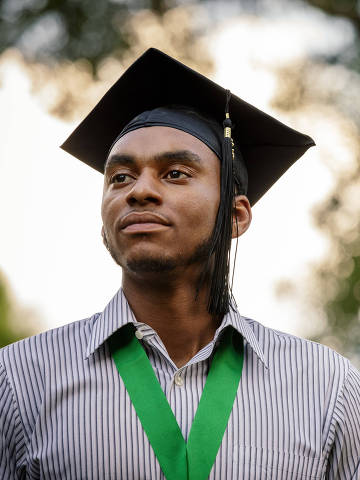 John Cooper, a political science major with $98,000 in student loans, after graduating from Morehouse, a historically black college in Atlanta, May 19, 2019. The commencement speaker, Robert F. Smith, the richest black man in the United States, promised to pay off the debt of all 396 graduates of the class of 2019. ?Not only does this donation help create generational wealth, but it inspires people to give back,? Cooper said. (Audra Melton/The New York Times) ORG XMIT: XNYT167