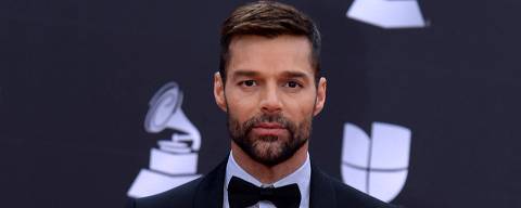 (FILES) In this file photo taken on November 14, 2019 Puerto Rican musician and host Ricky Martin arrives at the 20th Annual Latin Grammy Awards in Las Vegas, Nevada. - Police in San Juan, Puerto Rico, reported Saturday that a judge has issued a restraining order against superstar Ricky Martin. (Photo by Bridget BENNETT / AFP)