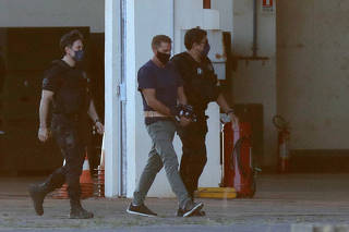 FILE PHOTO: Italian drug lord Rocco Morabito is escorted by federal police, in Brasilia