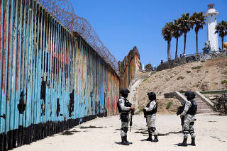 Members of the National Guard patrol Playas Tijuana