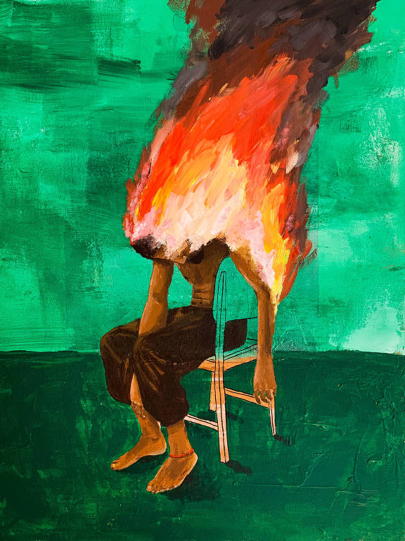 homem sentado em cadeira e queimando