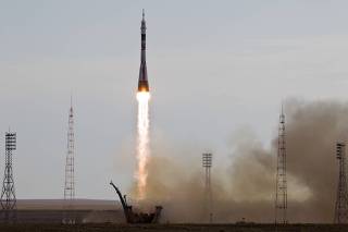 The Soyuz TMA-05M spacecraft carrying the International Space Station crew blasts off from its launch pad at Baikonur